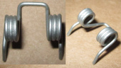 Пружина ручки дверцы люка для стиральной машины ELECTROLUX / ZANUSSI  / AEG (1240139020 / 1240139038)