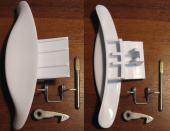 Ручка дверцы люка для стиральной машины INDESIT / HOTPOINT-ARISTON (065250 / 116580 / WL144)