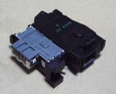 Замок люка / устройство блокировки для стиральной машины INDESIT / HOTPOINT-ARISTON (085610 / 111494